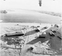 Снимок с самолёта из состава 114-й эскадрильи RAF во время атаки ими аэродрома Гердла, перед подготовкой к высадке десанта в ходе операции «Стрельба из лука» («Archery»), 27 декабря 1941 г.